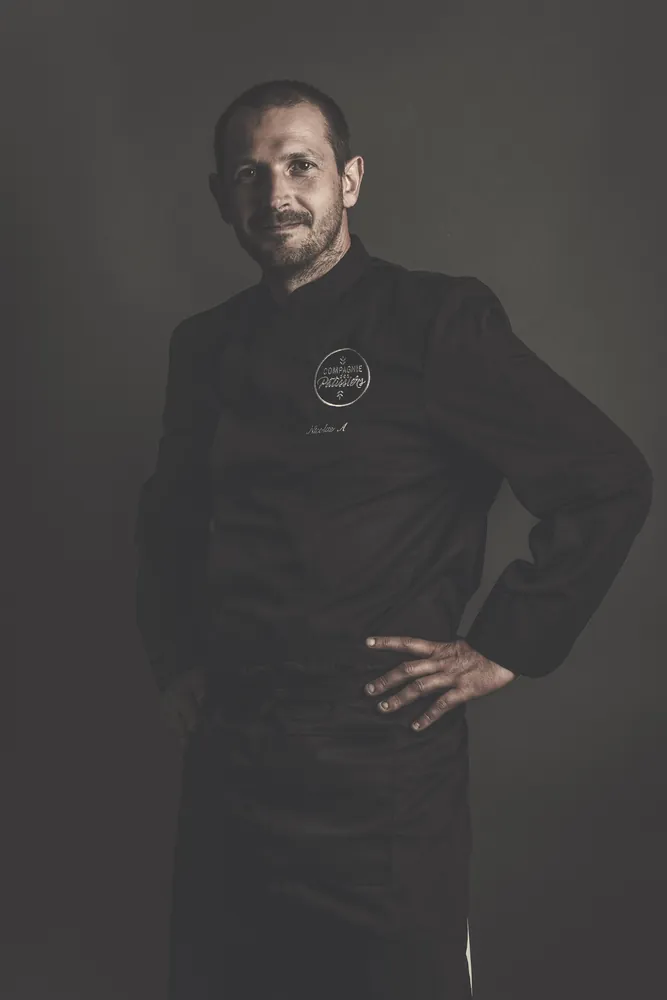 Nicolas A.